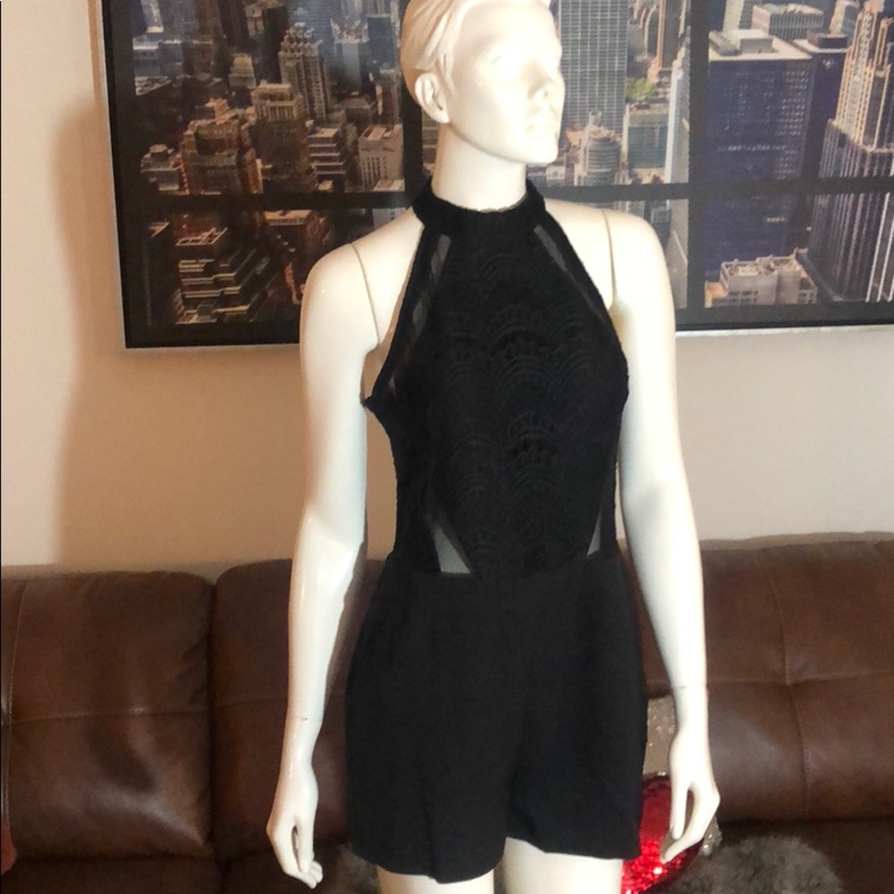 Black romper with sheer cut outs & real pockets!!!